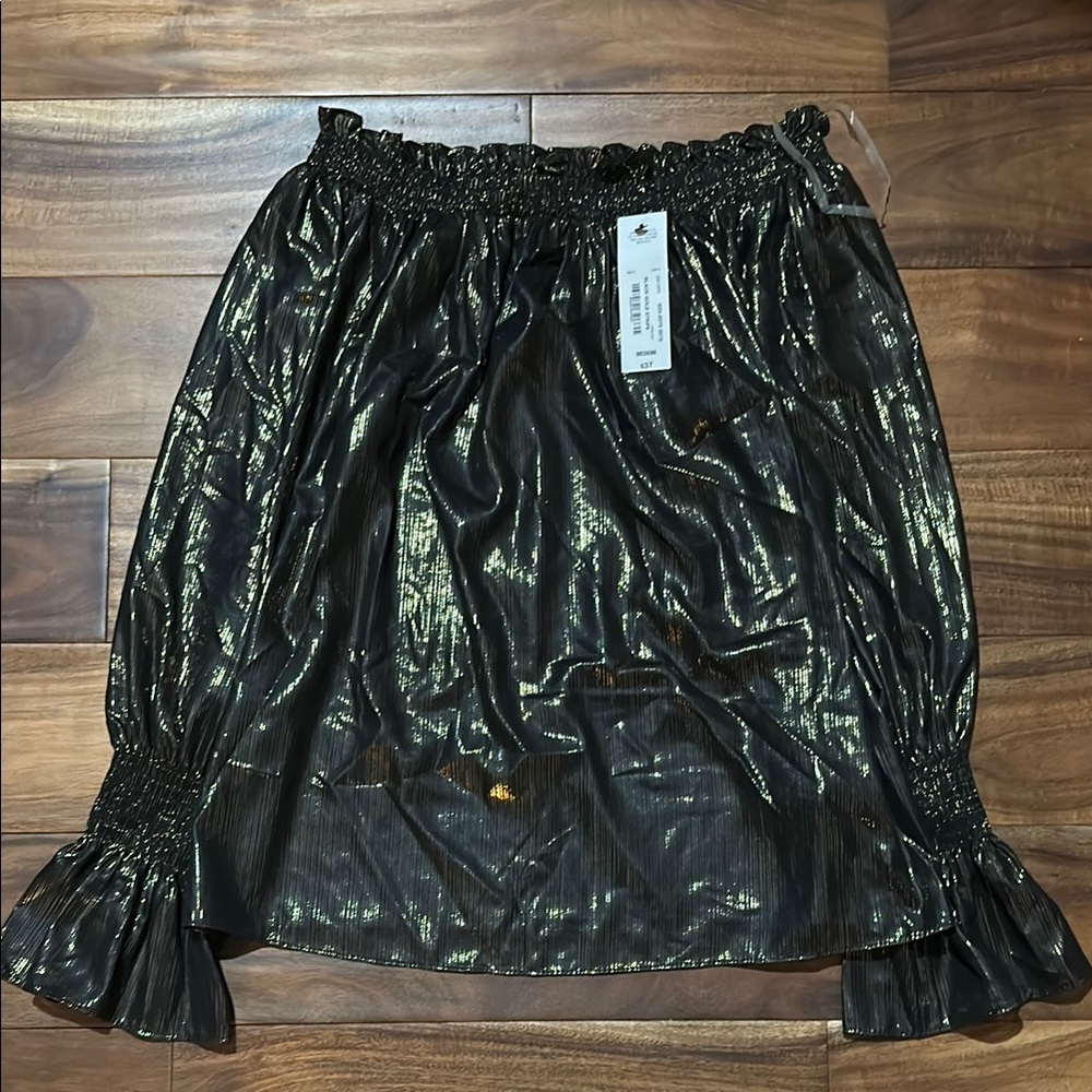 Black gold off shoulder bubble top with smocked and ruffled sleeves